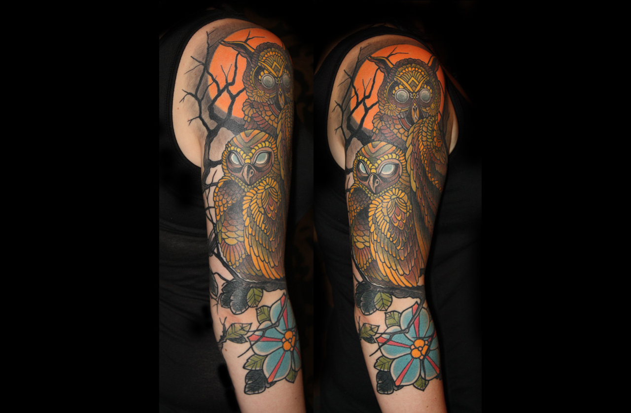 Oberarmtattoo mit Eulenmotiv