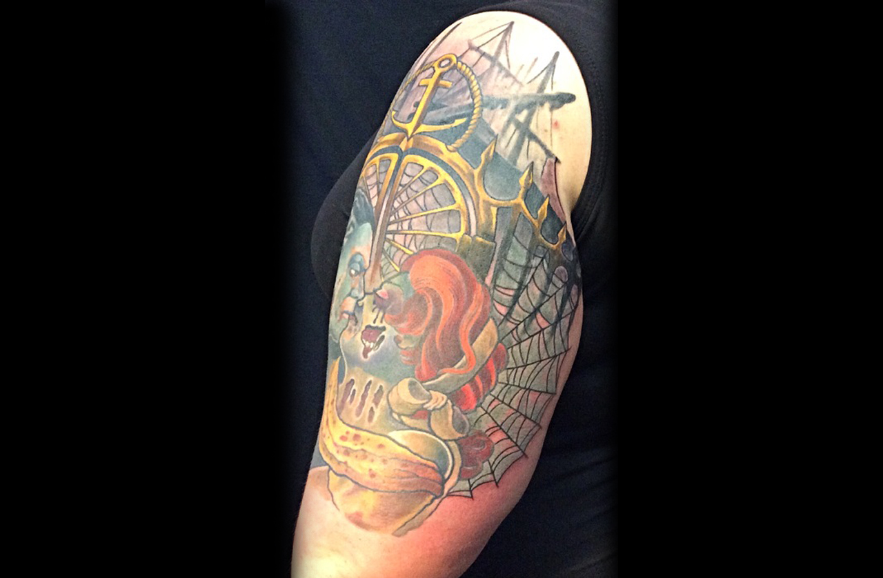 Oberarmtattoo mit Zombies