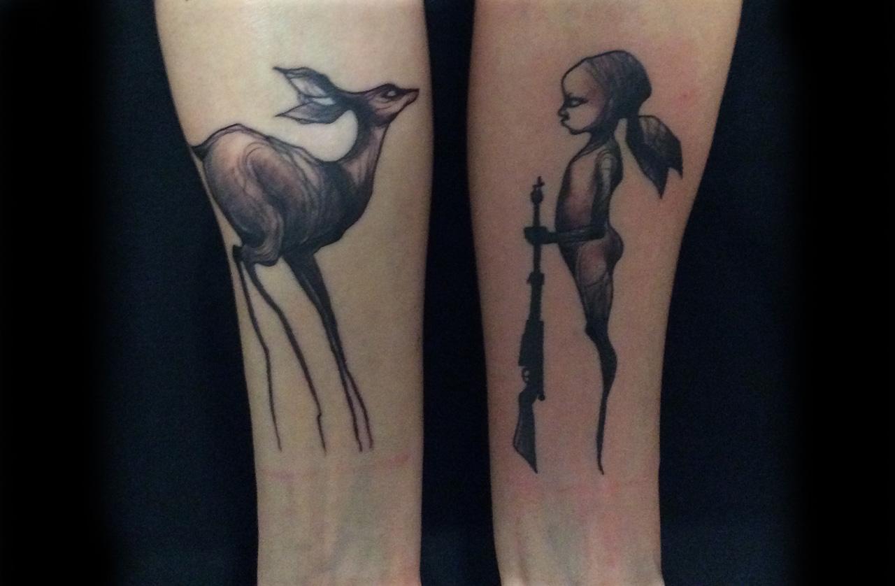 Unterarmtattoo black and grey, traditionell